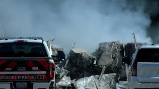 WebXtra: Kilgore fire crews monitoring recycling center fire for flare-ups