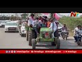 minister sabitha indra reddy drives tractor in tandur rally.. vikarabad rythu bandhu sambaralu ntv