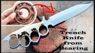 A RAZOR SHARP TRENCH KNIFE MADE FROM A RUSTY BEARING