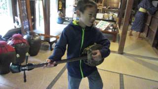 Learning to play the san-shin in Okinawa