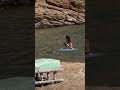 husband throws wife in sea