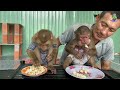 grandpa makes popcorn with his own hands monkeys enjoy