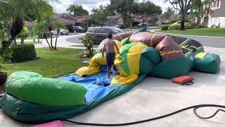 Inflating a waterslide and bounce  house combo