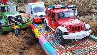Bruder toys / Build Bridge Blocks - Toy police car, ambulance, dump truck, crane