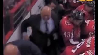 Barry Trotz Dramatically Falls After Getting Hit With Puck