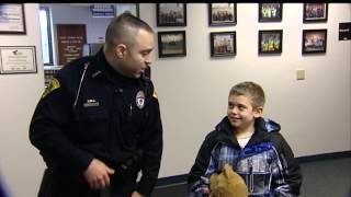 Portage officer saves boy from burning home