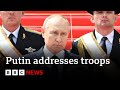 Russian troops 'stopped a civil war', Putin tells military - BBC News