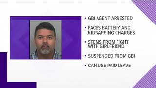 GBI employee arrested, suspended after allegedly threatening girlfriend trying to leave him