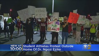 Student Athletes Protest Outside Home Of Dr. Ngozi Ezike