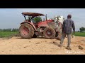 strong engine of tractor pushing soil ត្រាក់ទ័ររុញដីកលើខ្នងប្រឡាយ