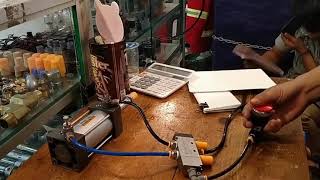 Pneumatic push button