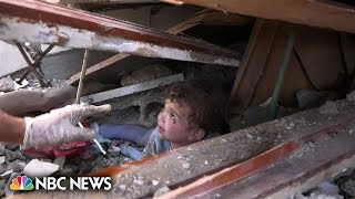 ‘This is a massacre!’: Rescue workers fight to save children in Gaza airstrike rubble