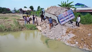 Incredible Dump truck driver back uploading fail landslide overturned Rescues by Power dozer pull