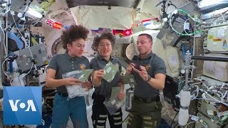 US Astronauts at the International Space Station Display Thanksgiving Food