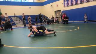 Girl wrestler beats boy 9-0 waves to mom