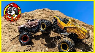 Monster Jam Truck TOYS - Wolf's Head \u0026 Earth Shaker PLAY at the PARK \u0026 HUGE Mud Mountain WATER ARENA