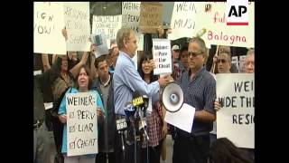 Foes and supporters of embattled Rep. Anthony Weiner yelled at each other in front of the New York D