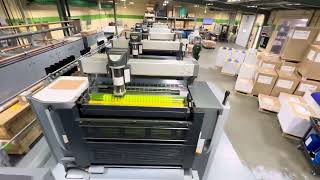 Our Heidelberg CX102-6L press bookin’ it at 16,500 sheets/hr.