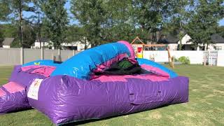 Inflating a bounce house castle￼
