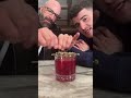 a cocktail made with blueberries 🫐🥃