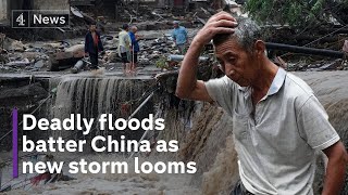 China floods: At least 11 people dead and dozens missing in Beijing