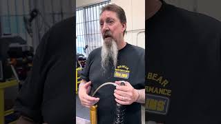 Kevin going over the Screamin Eagle vs Öhlins Shock