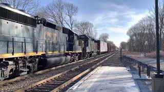 CSX L010 northbound to Readville through Islington on 3/14/22