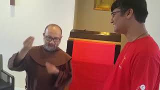 Br Praveen Interacts with Br Rowland in Singapore