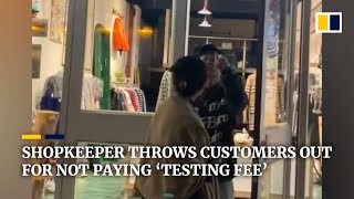 Chinese shopkeeper throws customers out for not paying ‘testing fee’