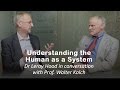 Understanding the human as a system: Leroy Hood in conversation with Walter Kolch