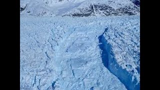 Helheim Glacier massive retreat, calving Greenland glacier in Helheim fjord  due to climate change,