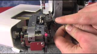 1110DX upper looper drive arm position