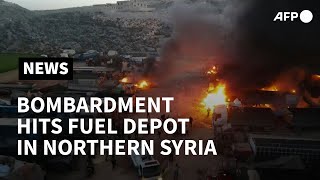 Smoke billows after bombardment hits fuel depot in northern Syria | AFP