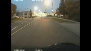 Pedestrian Walking in the Middle Of Street At Night