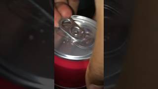 Opening a soda in slow motion