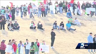 Hundreds protest Trump’s immigration orders at Scissortail Park