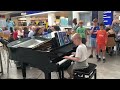 Amazing airport pianist- Harrison aged 11 plays Ludovico Einaudi cover Nuvole Bianche