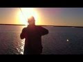 Capt. Scott Sommerlatte first redfish of the day with LSON's David Sams