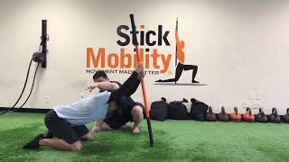 Child's Pose with T-spine Mobilization - Stick Mobility Exercise