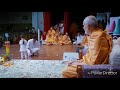 Small child pray before Mahant swami Maharaj.