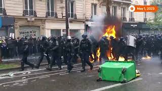 Petrol bomb engulfs Paris police in flames
