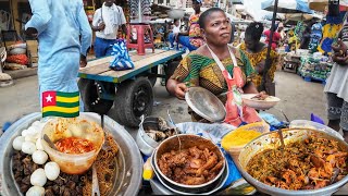 Delicious African street food in the biggest market in Togo west Africa. Assigam