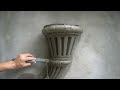 the idea of making a unique wall flower pot