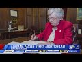 Alabama governor signs near-total abortion ban into law