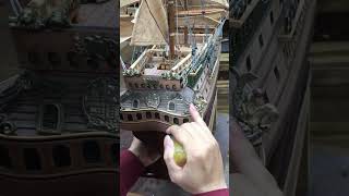 Discover intricate details of historic wooden ship models 🚢⚓️