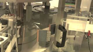 Quadrel | Labeling System | Pressure Sensitive | High Speed Labeling | Beer Bottles