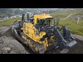 Komatsu D375A-8 pushing big blades