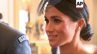 Duke and Duchess of Sussex greet guests at Buckingham Palace