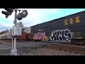 csx mixed manifest freight train crossing mill road