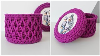 Basket made of knitted yarn with a lid. Crochet honeycomb pattern.